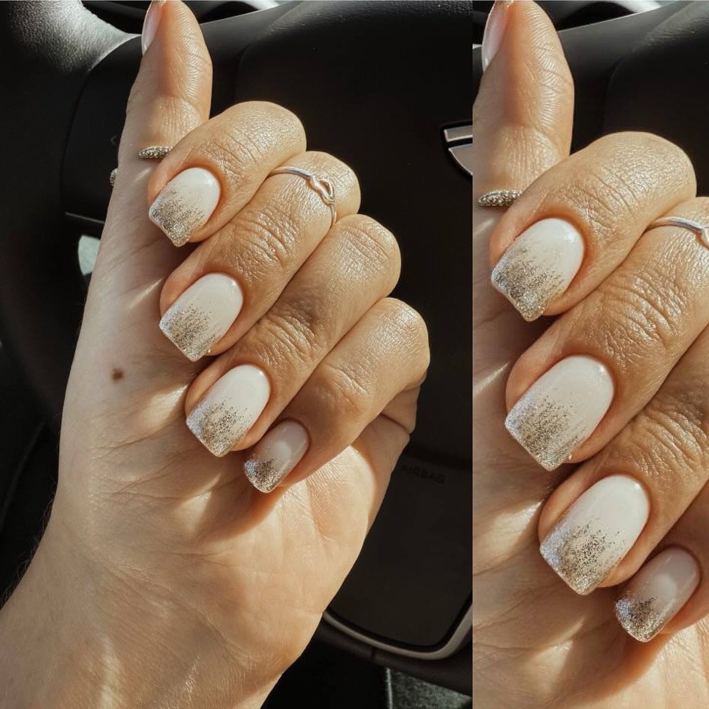 White nails with glitter ombre at the tips, rings on fingers.