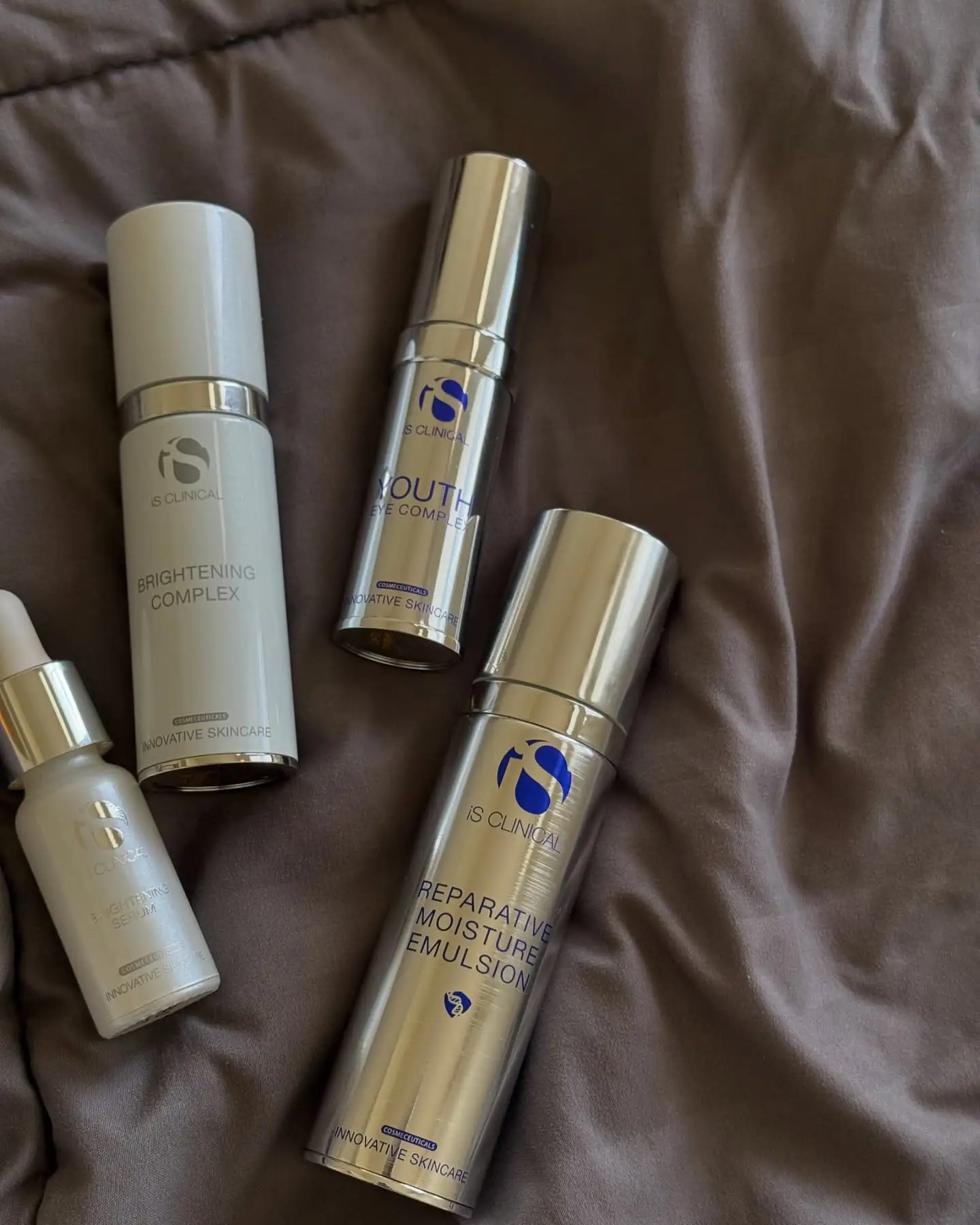 nn IS CLINICAL Brightening Complex, Youth Eye Complex, Reparative Moisture Emulsion.